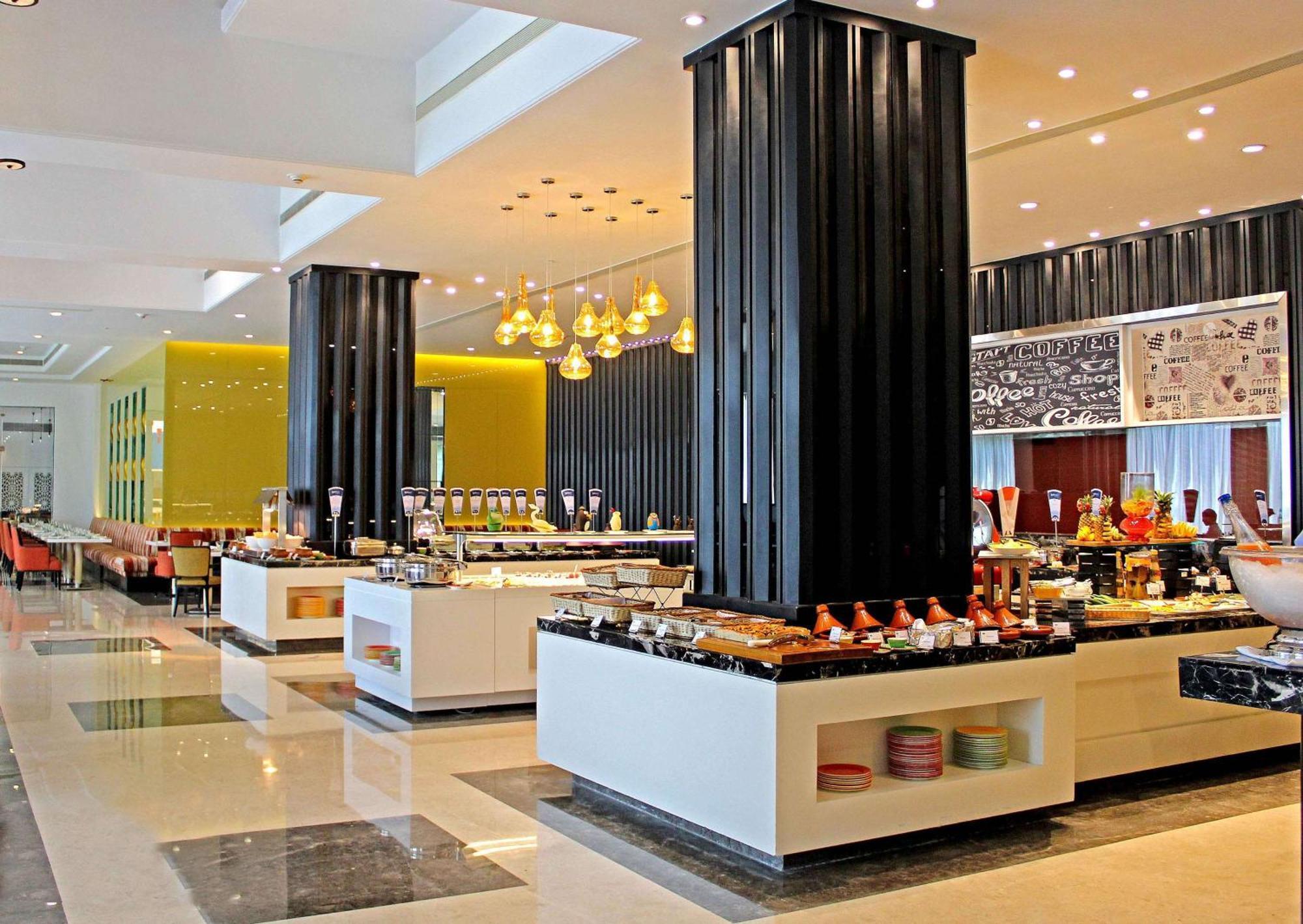 Hotel Radisson Blu Bengaluru Outer Ring Road Exterior foto